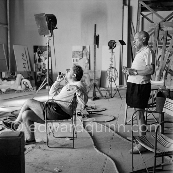 Pablo Picasso and Clouzot. Shooting break. The making of "La plage à la Garoupe I" for the film "Le mystère Picasso". Nice, Studios de la Victorine, 1955. - Photo by Edward Quinn