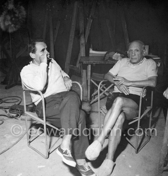 Pablo Picasso and Clouzot. Shooting break. During filming of "Le mystère Picasso". Nice, Studios de la Victorine, 1955. - Photo by Edward Quinn