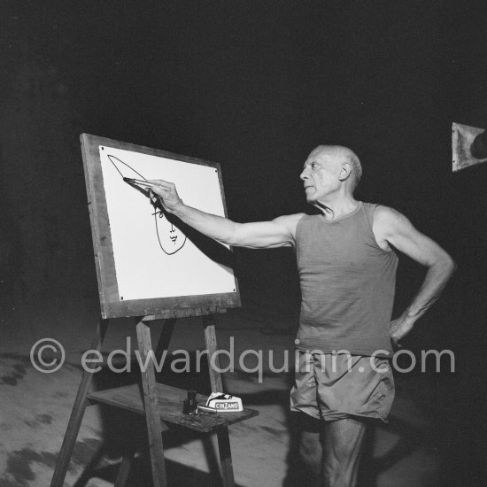 Pablo Picasso at work during filming of "Le mystère Picasso". Nice, Studios de la Victorine, 1955. - Photo by Edward Quinn