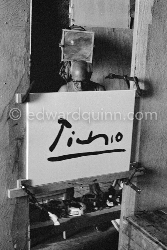 Pablo Picasso working on "La Célestine" where he had to do his signature backwards. "Le mystère Picasso", Nice, Studios de la Victorine 1955. - Photo by Edward Quinn