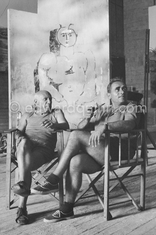 Pablo Picasso and film director Henri-Georges Clouzot. During filming of "Le mystère Picasso", Nice, Studios de la Victorine 1955. - Photo by Edward Quinn