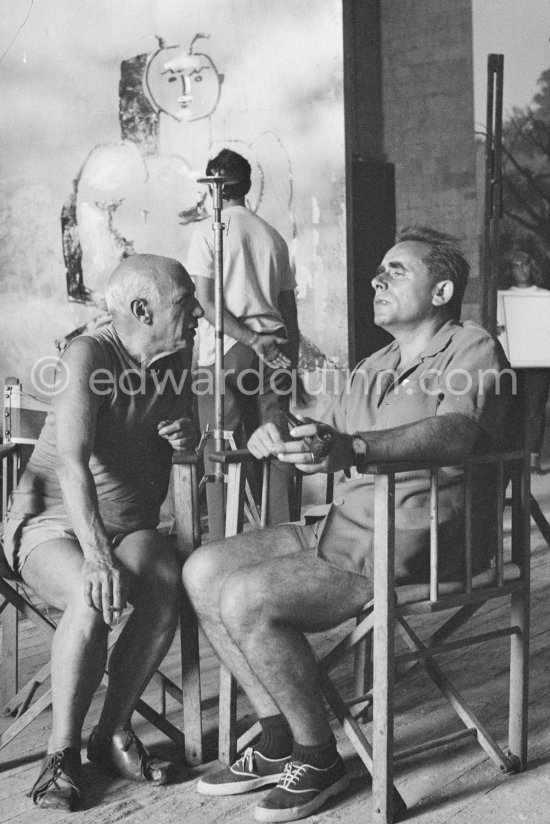 Pablo Picasso and film director Henri-Georges Clouzot. During filming of "Le mystère Picasso", Nice, Studios de la Victorine 1955. - Photo by Edward Quinn