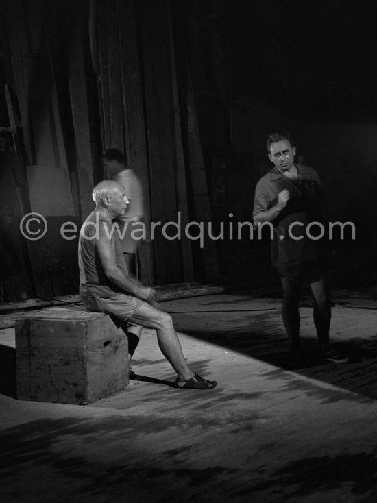 Pablo Picasso and film director Henri-Georges Clouzot. During filming of "Le mystère Picasso", Nice, Studios de la Victorine 1955. - Photo by Edward Quinn