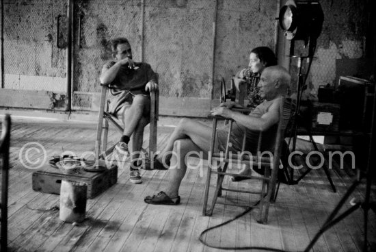 Pablo Picasso, Jacqueline and Henri-Georges Clouzot. "Le mystère Picasso", Nice, Studios de la Victorine 1955. - Photo by Edward Quinn
