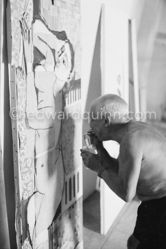 Pablo Picasso fixing the charcoal in the painting "Femme nue allongé [Grand nu allongé]". Nice, Studios de la Victorine 1955. - Photo by Edward Quinn