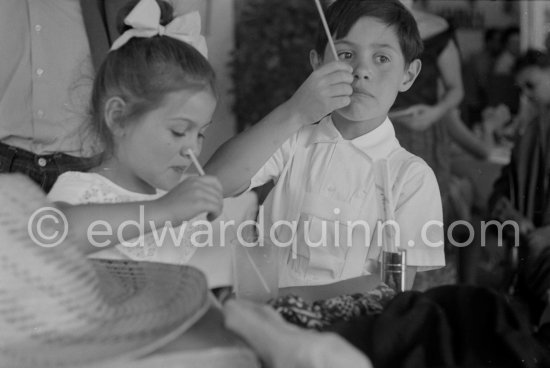 Paloma Picasso and Claude Picasso at the lunch given for his friends by Pablo Picasso at restaurant Le Vallauris before the bullfight. Vallauris 1955. - Photo by Edward Quinn