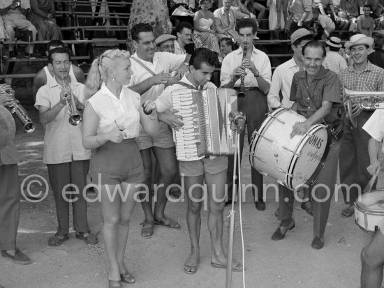 At Pablo Picasso's arrival on the village square where the corrida is to be held the band blares out some of his favourite Spanish melodies. Vallauris 1955. - Photo by Edward Quinn