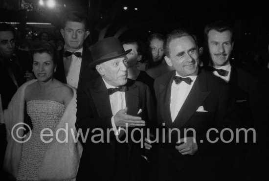 Picasso, Paulo, Henri-Georges Clouzot and Vera Clouzot attending the showing of "Le mystère Picasso" ("The Mystery of Picasso"). Cannes Film Festival 1956. - Photo by Edward Quinn