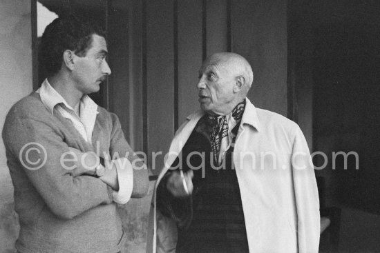 Pablo Picasso and not idenified person. Exhibition at Madoura? On the occasion of Pablo Picasso's 75th birthday on 25.10.Vallauris 1956. - Photo by Edward Quinn