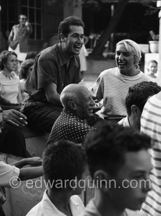 Picasso and Maya at the traditional parade after the corrida in a Renault 1925 with bull's horns. Vallauris 1956. - Photo by Edward Quinn