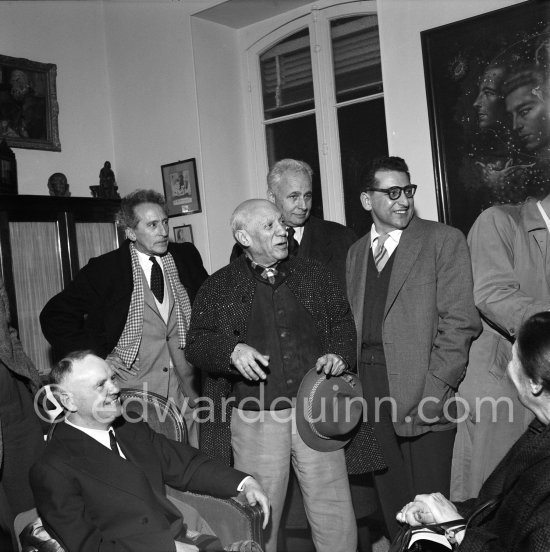 Pablo Picasso at a private viewing of his book illustrations. From left Maurice Thorez, Jean Cocteau, Louis Aragon, Georges Tabaraud (journal "Le Patriote"). Exposition "Pablo Picasso. Un Demi-Siècle de Livres Illustrés". Galerie H. Matarasso. 21.12.1956-31.1.1957. Nice 1956. - Photo by Edward Quinn