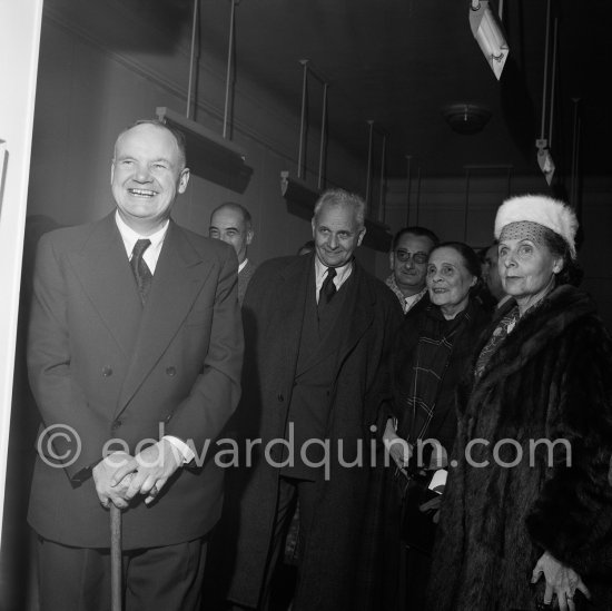 Maurice Thorez with Louis Aragon, his wife, famous lady communist Elsa Triolet and her older sister Lilja Brik, muse of Vladimir Maykovsky, at a private viewing of Pablo Picasso\'s book illustrations in the Matarasso gallery in Nice. "Pablo Picasso. Un Demi-Siècle de Livres Illustrés". Galerie H. Matarasso. 21.12.1956-31.1.1957. Nice 1956. - Photo by Edward Quinn