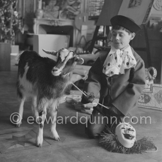 Claude Picasso dressed up as a clown. With goat Esmeralda. La Californie, Cannes 1956. - Photo by Edward Quinn