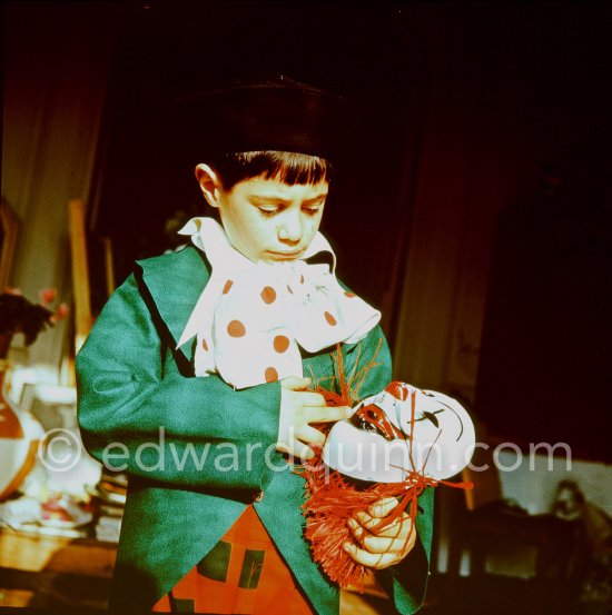 Claude Picasso, dressed up as a clown. La Californie, Cannes 1956. - Photo by Edward Quinn