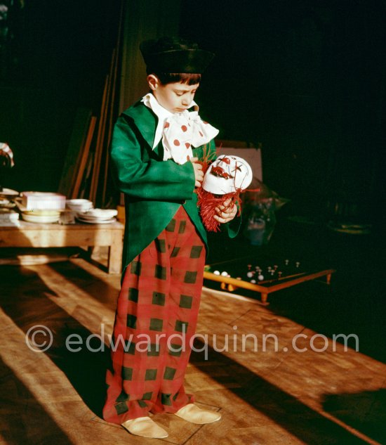 Claude Picasso dressed up as a clown. With goat Esmeralda. La Californie, Cannes 1956. - Photo by Edward Quinn