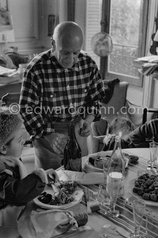 Pablo Picasso and Paloma Picasso at Christmas. La Californie, Cannes 1956. - Photo by Edward Quinn