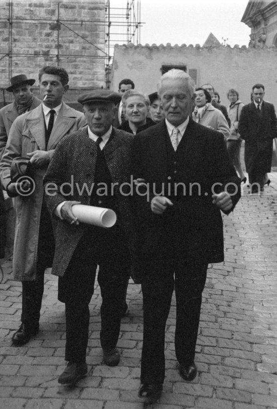 Pablo Picasso is Honorary Citizen of Antibes. Left Paulo Picasso, on the right Romuald Dor de la Souchère, founder and curator of the Grimaldi Museum, Antibes, later Musée Pablo Picasso. Château d\'Antibes 25.2.1957. (Certificate of 23.8.1956) - Photo by Edward Quinn