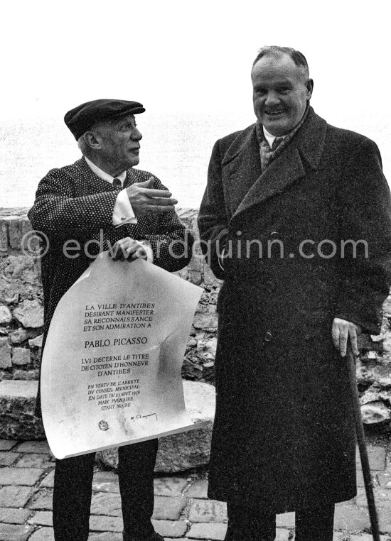 Pablo Picasso with Maurice Thorez, leader of the French Communist Party (PCF). Pablo Picasso holds the certificate "Honorary Citizen of Antibes" of 23.8.1956. Château d\'Antibes 25.2.1957. - Photo by Edward Quinn