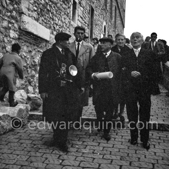 Pablo Picasso is Honorary Citizen of Antibes. On the left Paulo Picasso, right Romuald Dor de la Souchère, founder and curator of the Grimaldi Museum, Antibes, later Musée Pablo Picasso and his wife Blanche. Château d\' Antibes 23.8.1956 - Photo by Edward Quinn