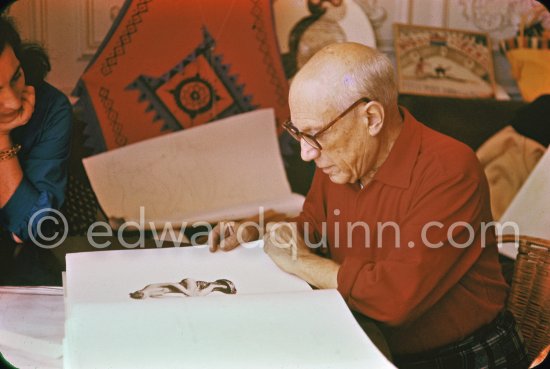 Pablo Picasso and Jacqueline viewing Palissy book. La Californie, Cannes 1957. - Photo by Edward Quinn