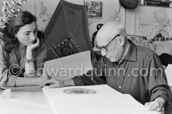 Pablo Picasso and Jacqueline viewing a book about Bernard Palissy, French potter of the 16th century. La Californie, Cannes 1957. - Photo by Edward Quinn
