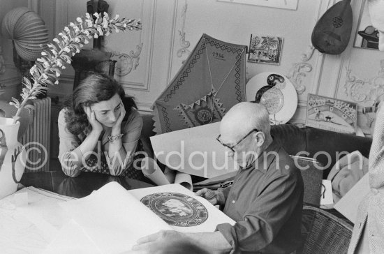 Pablo Picasso and Jacqueline viewing a book about Bernard Palissy, French potter of the 16th century. La Californie, Cannes 1957. - Photo by Edward Quinn