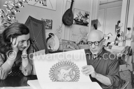 Pablo Picasso and Jacqueline viewing a book about Bernard Palissy, French potter of the 16th century. La Californie, Cannes 1957. - Photo by Edward Quinn