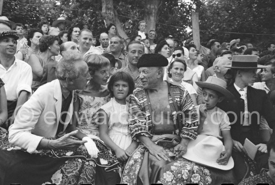 Local Corrida. Javier Vilató, Jean Cocteau, Francine Weisweiller, Paloma Picasso, Pablo Picasso, Claude Picasso, French lady bullfighter Pierrette Le Bourdiec. Vallauris 1957. - Photo by Edward Quinn