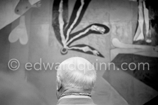 Pablo Picasso on the occasion of the unveiling of mural "The Fall of Icarus" ("La chute d'Icare") for the conference hall of UNESCO building in Paris. The mural is made up of forty wooden panels. Initially titled "The Forces of Life and the Spirit Triumphing over Evil", the composition was renamed in 1958 by George Salles, who preferred the current title, "The Fall of Icarus" ("La chute d'Icare"). Vallauris, 29 March 1958. - Photo by Edward Quinn