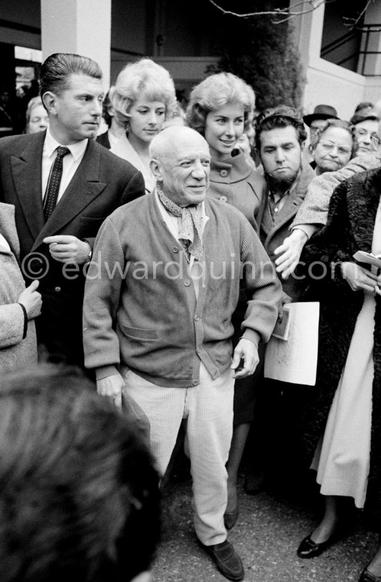 Pablo Picasso and Paulo Picasso. Unveiling of mural "The Fall of Icarus" ("La chute d\'Icare") for the conference hall of UNESCO building in Paris. The mural is made up of forty wooden panels. Initially titled "The Forces of Life and the Spirit Triumphing over Evil", the composition was renamed in 1958 by George Salles, who preferred the current title, "The Fall of Icarus" ("La chute d\'Icare"). Vallauris, 29 March 1958. - Photo by Edward Quinn