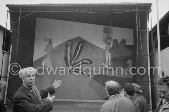 from left Georges Salles, President of the ICOM (left) and Henri Laugier, Member of the Executive committee of the UNESCO. Unvealing of the mural "The Fall of Icarus" ("La chute d\'Icare") for the conference hall of UNESCO building in Paris. Vallauris, 29 March 1958. from left Georges Salles, President of the ICOM (left) and Henri Laugier, Member of the Executive committee of the UNESCO. Unveiling of mural "The Fall of Icarus" ("La chute d\'Icare") for the conference hall of UNESCO building in Paris. The mural is made up of forty wooden panels. Initially titled "The Forces of Life and the Spirit Triumphing over Evil", the composition was renamed in 1958 by George Salles, who preferred the current title, "The Fall of Icarus" ("La chute d\'Icare"). Vallauris, 29 March 1958. - Photo by Edward Quinn