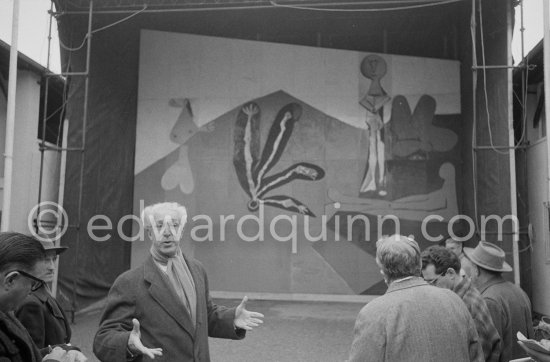 from left Georges Salles, President of the ICOM (left) and Henri Laugher, Member of the Executive committee of the UNESCO. Unvealing of the mural "The Fall of Icarus" ("La chute d\'Icare") for the conference hall of UNESCO building in Paris. Vallauris, 29 March 1958. from left Georges Salles, President of the ICOM (left) and Henri Laugier, Member of the Executive committee of the UNESCO. Unveiling of mural "The Fall of Icarus" ("La chute d\'Icare") for the conference hall of UNESCO building in Paris. The mural is made up of forty wooden panels. Initially titled "The Forces of Life and the Spirit Triumphing over Evil", the composition was renamed in 1958 by George Salles, who preferred the current title, "The Fall of Icarus" ("La chute d\'Icare"). Vallauris, 29 March 1958. - Photo by Edward Quinn