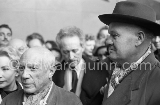 Pablo Picasso, Jean Cocteau and Maurice Thorez, leader of the French Communist Party (PCF). Unveiling of mural "The Fall of Icarus" for the conference hall of UNESCO building in Paris. The mural is made up of forty wooden panels. Initially titled "The Forces of Life and the Spirit Triumphing over Evil", the composition was renamed in 1958 by George Salles, who preferred the current title, "The Fall of Icarus". Vallauris, 29 March 1958. - Photo by Edward Quinn