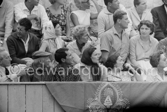 What happens? At the bullfight from left: Jean Cocteau, Pablo Picasso, Luis Miguel Dominguin (spectator because of injuries), Lucia Bosè, Jacqueline. Second row Pablo Picasso’s chauffeur Jeannot, Catherine Hutin. Corrida des vendanges. Arles 1959. - Photo by Edward Quinn