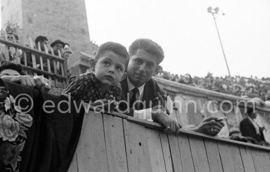 At a bullfight, Paulo Picasso and an unknown boy. Corrida des vendanges. Arles 1959. - Photo by Edward Quinn
