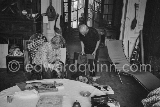 Pablo Picasso showing a linoblock to Edouard Pignon. La Californie, Cannes 1959. - Photo by Edward Quinn