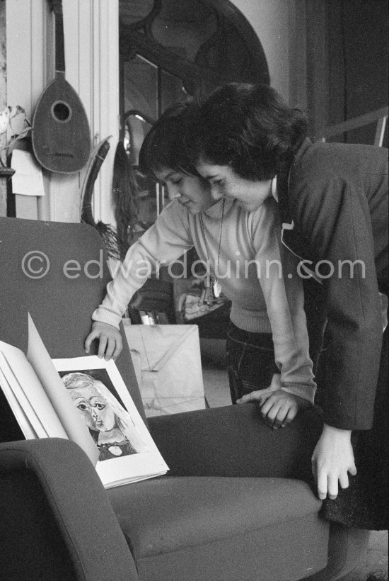 Paloma Picasso and Catherine Hutin with a book on the armchair. La Californie, Cannes 1959. - Photo by Edward Quinn