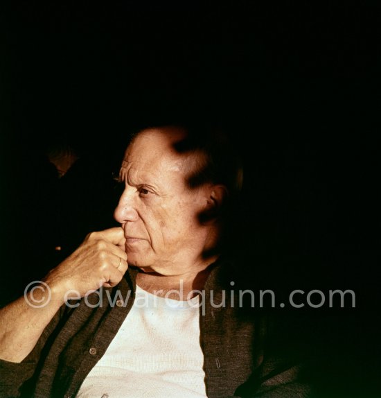 Pablo Picasso in the rocking-chair with a special lighting. La Californie, Cannes 1959. - Photo by Edward Quinn