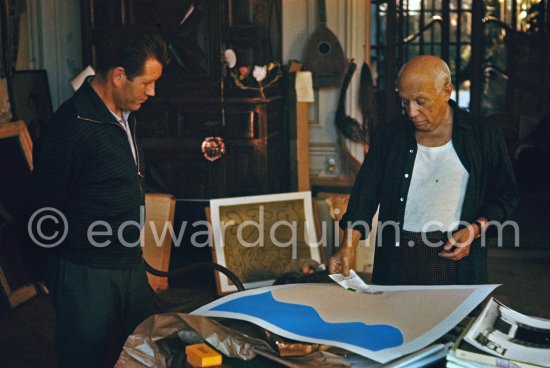 Pablo Picasso correcting "Faunes et chèvres". With chauffeur Jeannot. La Californie, Cannes 1959. - Photo by Edward Quinn