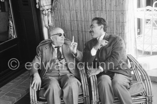 Jaime Sabartés and Michele Sapone, Pablo Picasso\'s tailor. During filming of "Le Testament d’Orphée", film of Jean Cocteau. At Villa Santo Sospir of Francine Weisweiller. Saint-Jean-Cap-Ferrat 1959. - Photo by Edward Quinn