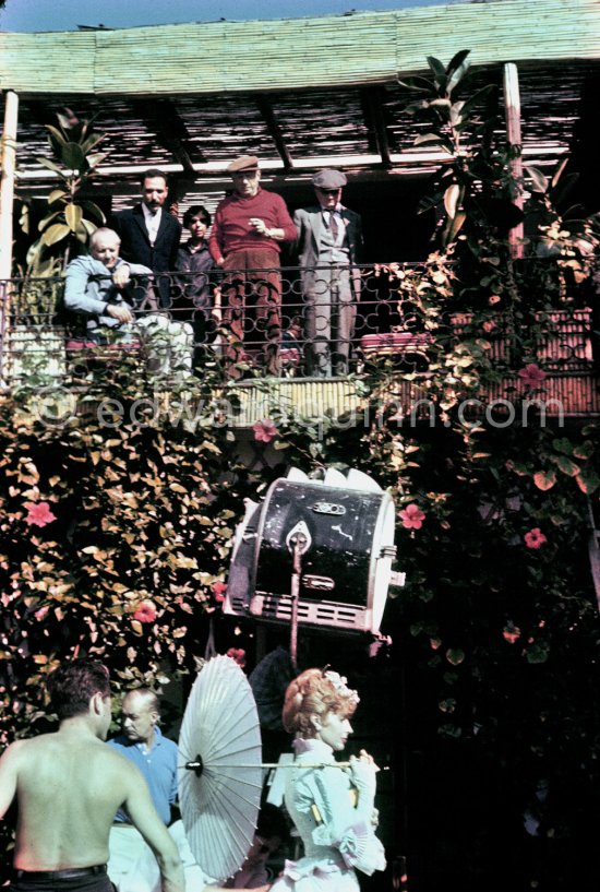 Francine Weisweiller during filming of "Le Testament d’Orphée", film of Jean Cocteau. On the balcony Alberto Magnelli, Michele Sapone, Susi Magnelli, Pablo Picasso and Sabartés. At Villa Santo Sospir of Francine Weisweiller. Saint-Jean-Cap-Ferrat 1959. - Photo by Edward Quinn