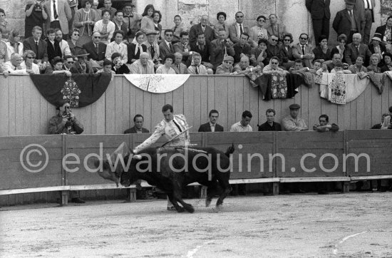 On the grandstand Pablo Picasso, Jacqueline, filming and Catherine Hutin, on the left Paulo Picasso watching Dominguin during a bullfight in Arles 1960. - Photo by Edward Quinn