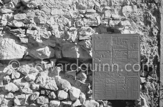 A stereotype mold ("flong") of a newspaper page ("Le Patriote") with inserts by Pablo Picasso, probably made with an intermediate plaster stage. Vallauris 1960. - Photo by Edward Quinn
