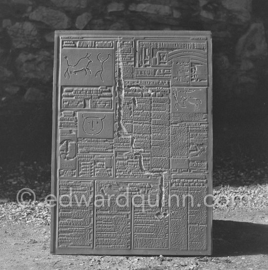 A stereotype mold ("flong") of a newspaper page ("Le Patriote") with inserts by Pablo Picasso, probably made with an intermediate plaster stage. Vallauris 1960. - Photo by Edward Quinn