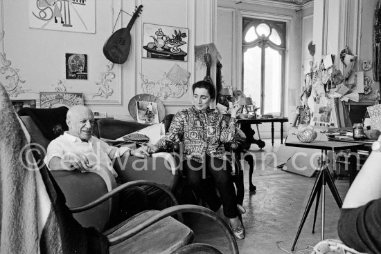 Pablo Picasso and Jacqueline. she is wearing a blouse made from a textile designed by Pablo Picasso. La Californie, Cannes 1961. - Photo by Edward Quinn