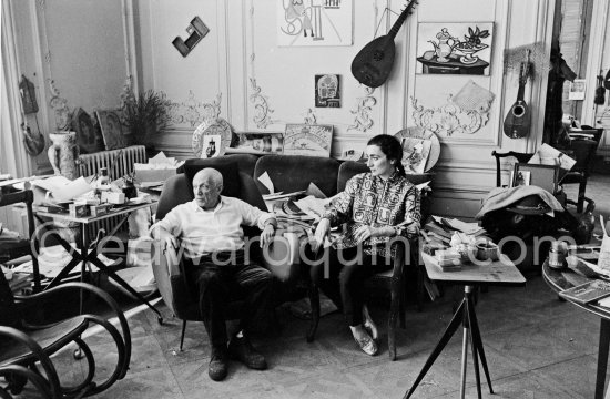 Pablo Picasso and Jacqueline. she is wearing a blouse made from a textile designed by Pablo Picasso. La Californie, Cannes 1961. - Photo by Edward Quinn