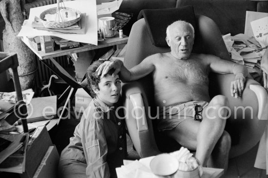 Pablo Picasso and Catherine Hutin. With Ripolin can. A table by Joseph-Marius Tiola in the background. La Californie 1961. - Photo by Edward Quinn
