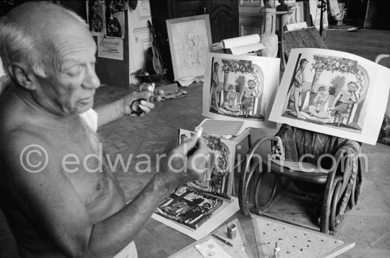 Pablo Picasso comparing original on cardboard and litho "Le repos du faune". La Californie, Cannes 1961. - Photo by Edward Quinn