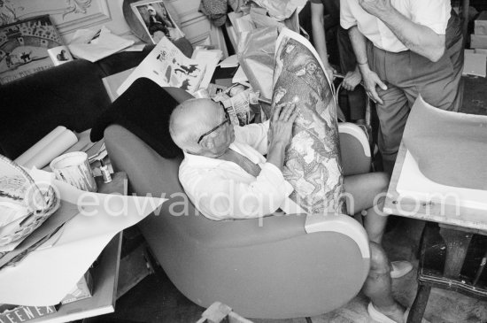 Pablo Picasso and Henri Matarasso, gallery owner and publisher, checking the etching "La Minotauromachie". La Californie, Cannes 1961. - Photo by Edward Quinn