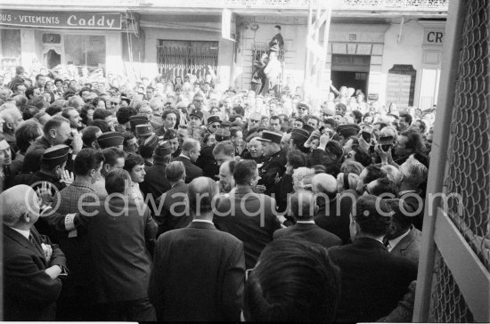 Pablo Picasso in the crowd on the way to the bullfight to honor his 80th birthday. Vallauris 29.10.1961. - Photo by Edward Quinn